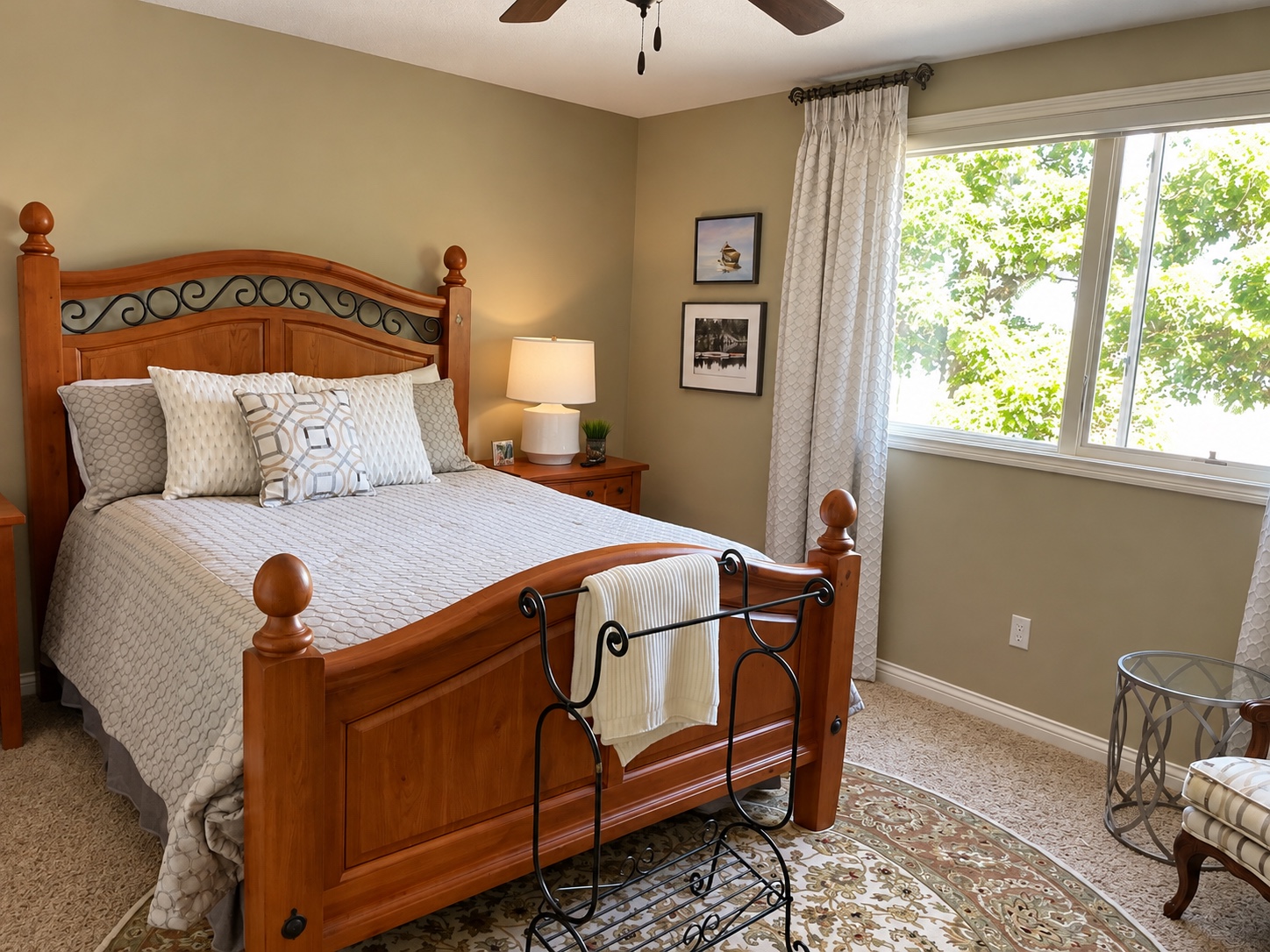 Original bedroom with traditional wood bed and existing furnishings